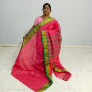 A lightweight Banahatti cotton saree with timeless checks, woven on a power loom, offering everyday comfort and elegance.