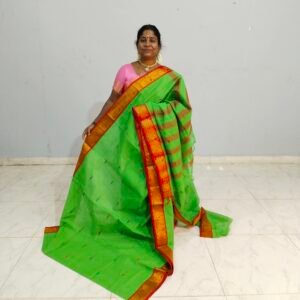 A lightweight Banahatti cotton saree with timeless checks, woven on a power loom, offering everyday comfort and elegance.