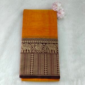 A classic Narayanan Pet saree crafted from mercerised cotton, featuring an elegant Lavanya type border with a running blouse for timeless charm.