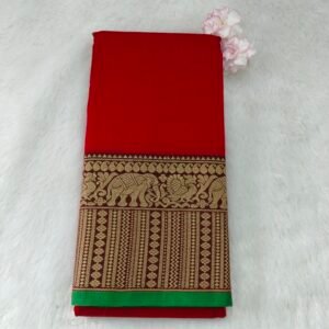 A classic Narayanan Pet saree crafted from mercerised cotton, featuring an elegant Lavanya type border with a running blouse for timeless charm.