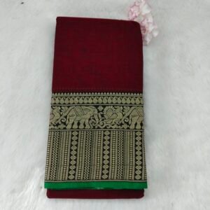 A classic Narayanan Pet saree crafted from mercerised cotton, featuring an elegant Lavanya type border with a running blouse for timeless charm.