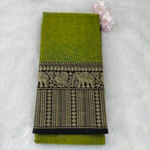 A classic Narayanan Pet saree crafted from mercerised cotton, featuring an elegant Lavanya type border with a running blouse for timeless charm.