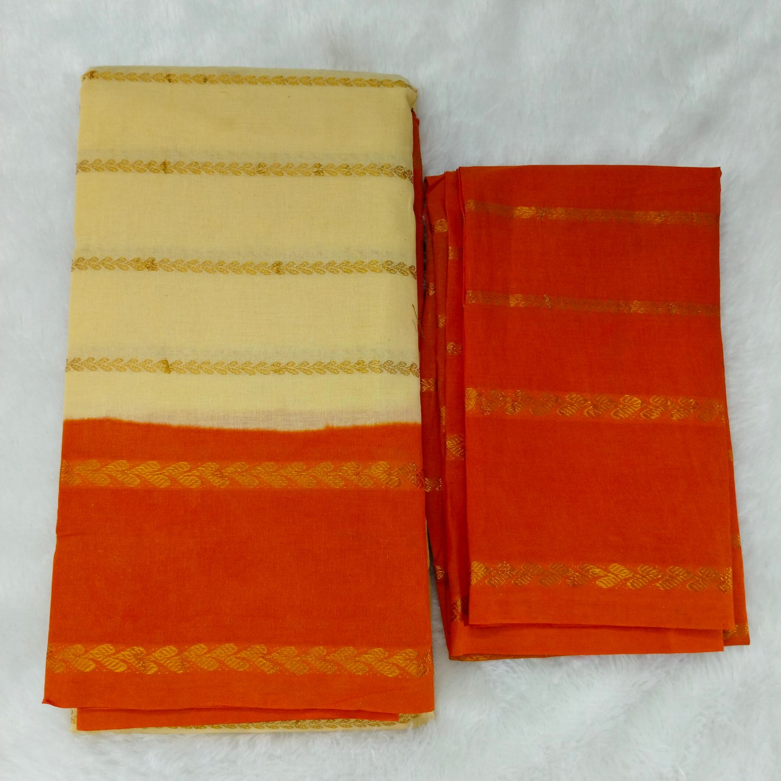 Elegant Light Sandal Sungudi Cotton Saree with Orange border and blouse – a subtle yet vibrant ethnic choice.