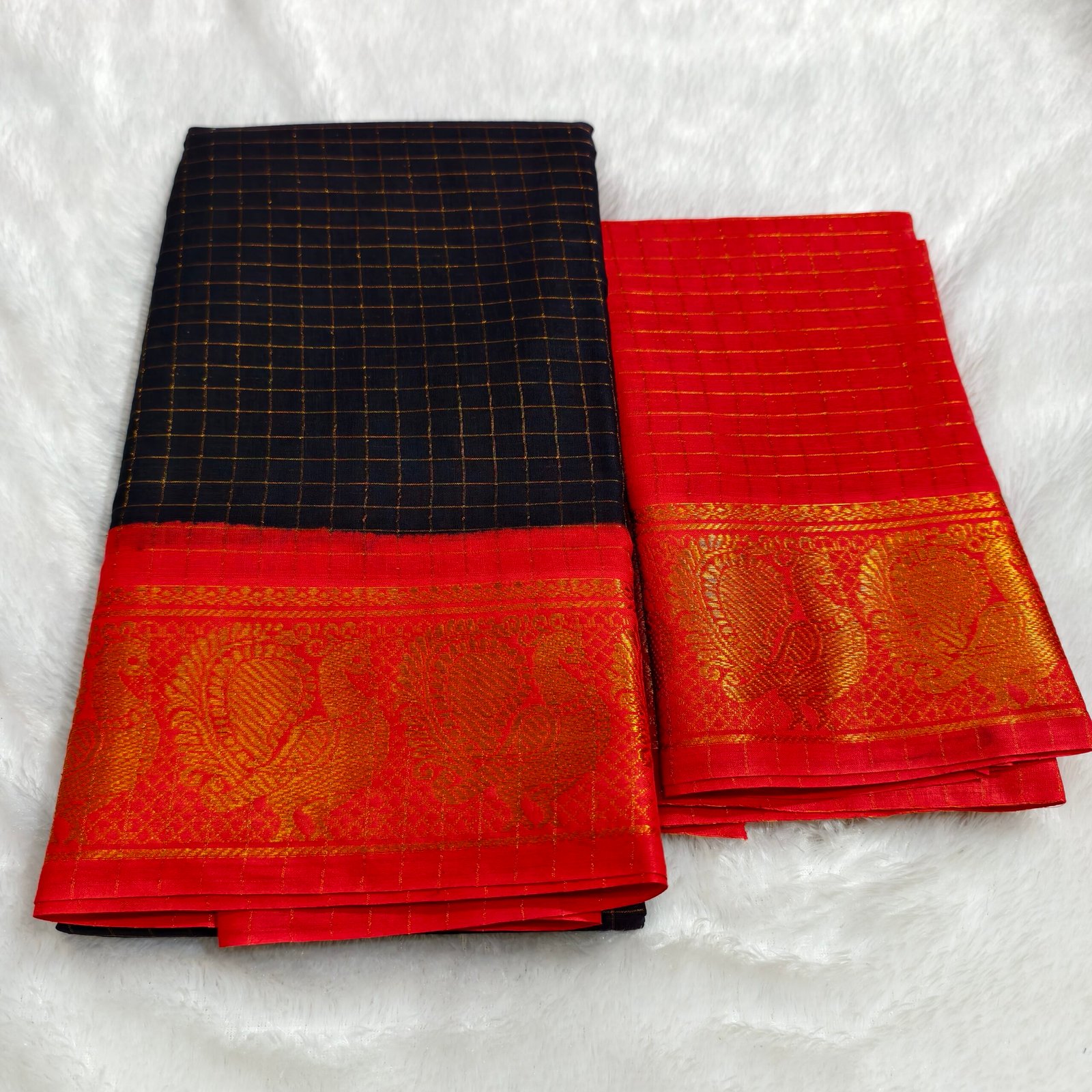 A premium soft cotton handloom Sungudi saree featuring gold zari kattam checks and a matching blouse—elegant, lightweight, and traditionally crafted