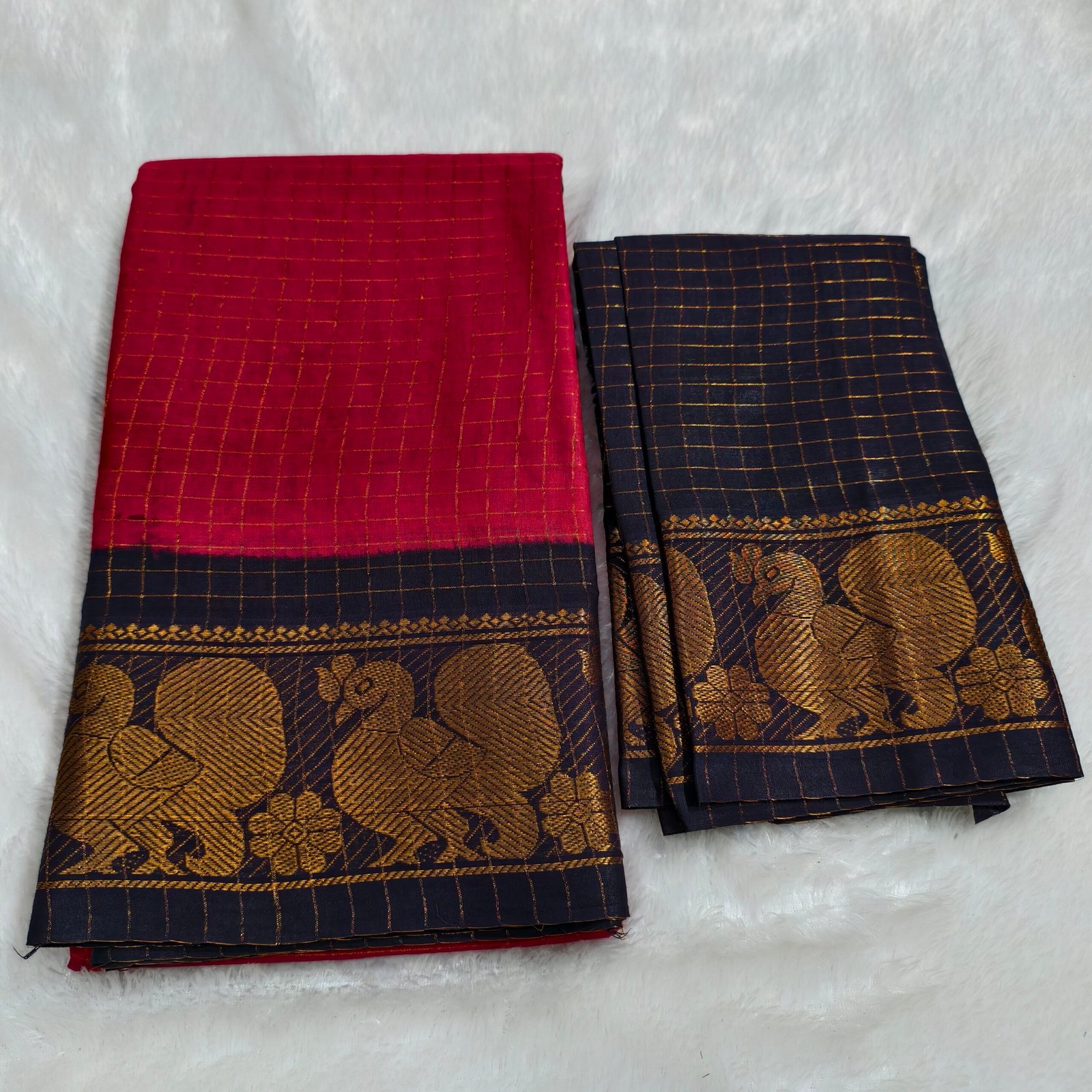 A premium soft cotton handloom Sungudi saree featuring gold zari kattam checks and a matching blouse—elegant, lightweight, and traditionally crafted