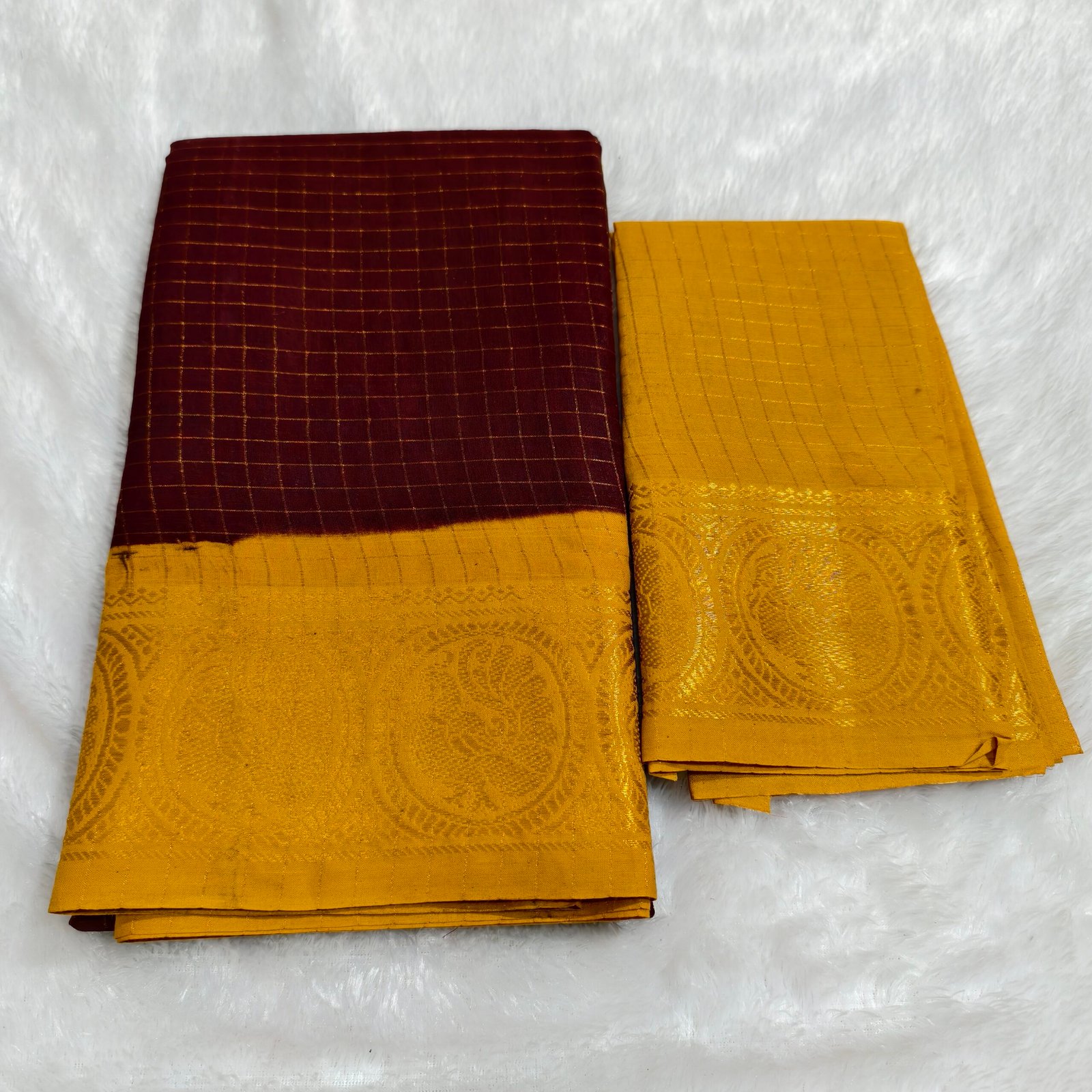 A premium soft cotton handloom Sungudi saree featuring gold zari kattam checks and a matching blouse—elegant, lightweight, and traditionally crafted