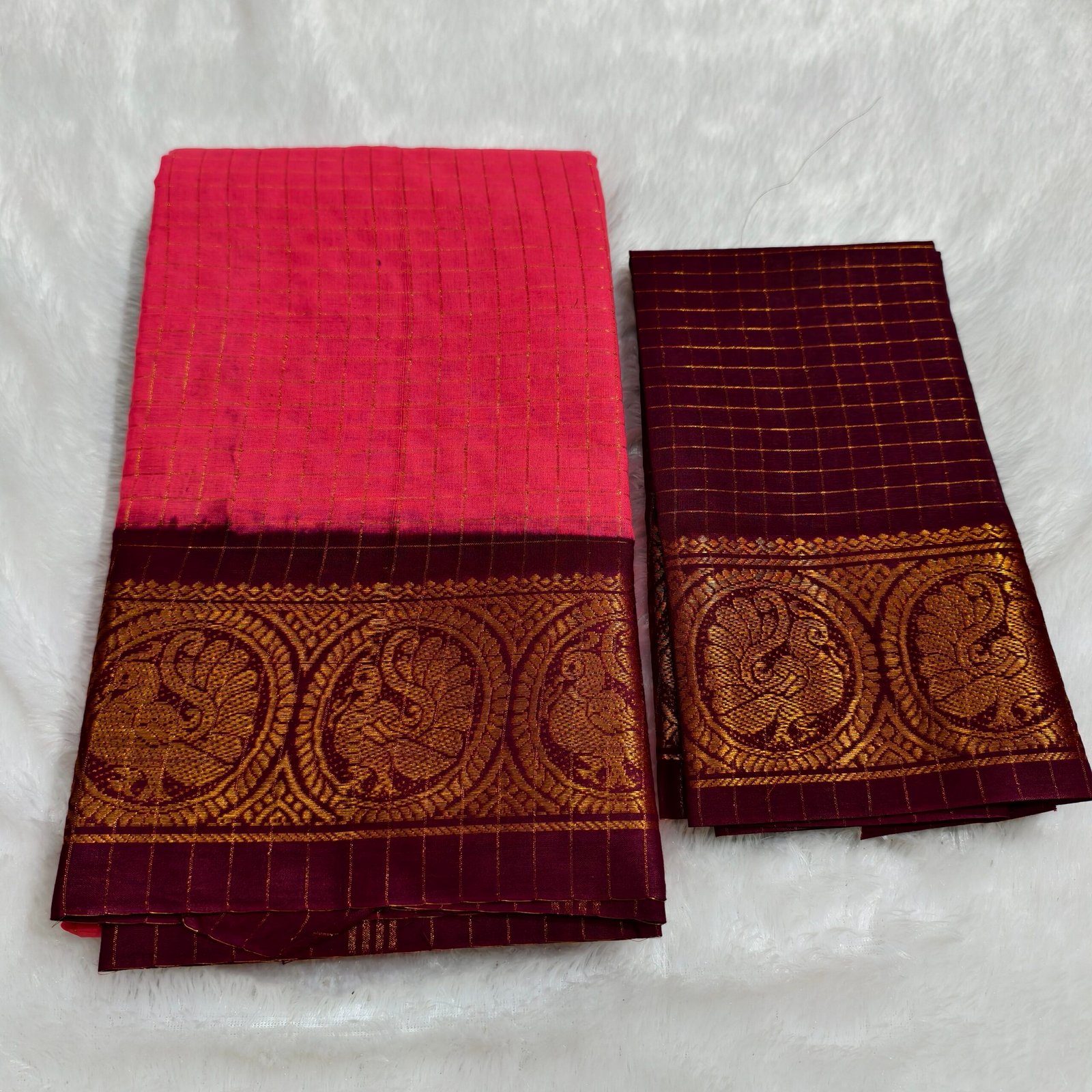 A premium soft cotton handloom Sungudi saree featuring gold zari kattam checks and a matching blouse—elegant, lightweight, and traditionally crafted